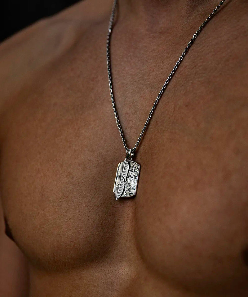 Pendentif artisanal plume